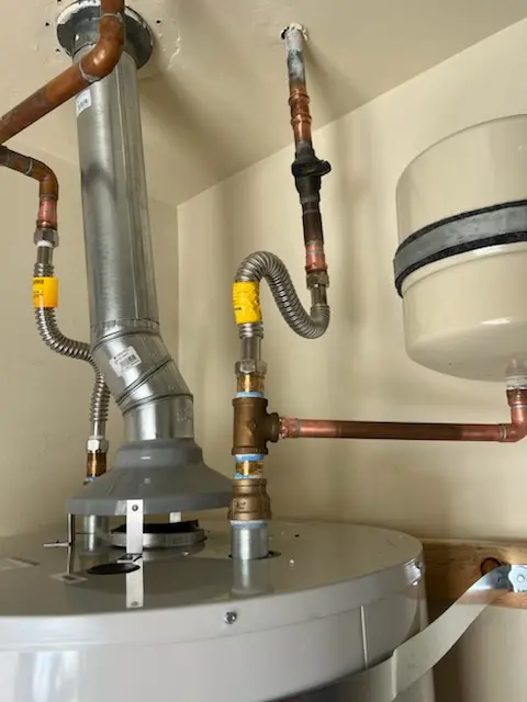 Water heater installation and plumbing repair in Village Builders